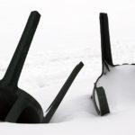 An image of some toppled chairs with snow at the Timberline Base Area at Bolton Valley Ski Resort in Vermont