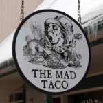 An image of the sign for "The Mad Taco" restaurant in Waitsfield, Vermont
