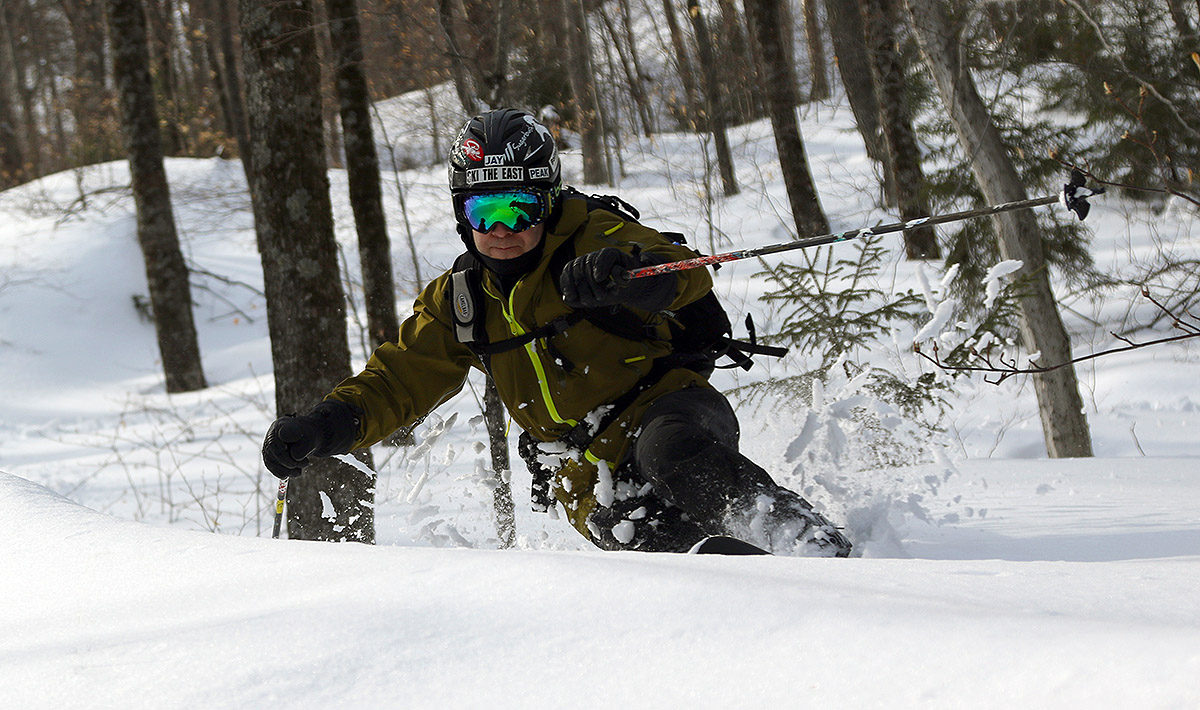 An image of Jay Telemark skiing in powder in the Lincoln Gap area of Vermont