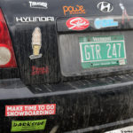 An image of bumper stickers on a car in the parking lot at Bolton Valley Ski Resort in Vermont
