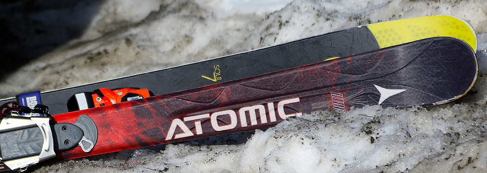 An image of skis on spring snow at the base of Bolton Valley Ski Resort in Vermont