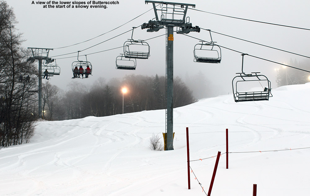 An image showing snowly slopes with fresh powder as night skiing gets going at Bolton Valley Ski Resort in Vermont