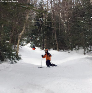 An image of Dylan Telemark skiing on the Bruce Trail near Stowe Mountain Resort in Vermont