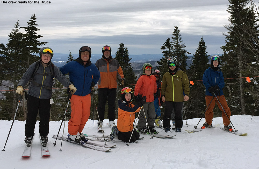 An image of BJAMS students and ski program coaches preparing for a trip down the Bruce Trail in the sidecountry of Stowe Mountain Ski Resort in Vermont