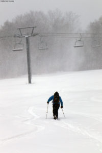 An image of Quinn skinning up in the Timberline area at Bolton Valley Ski Resort in Vermont
