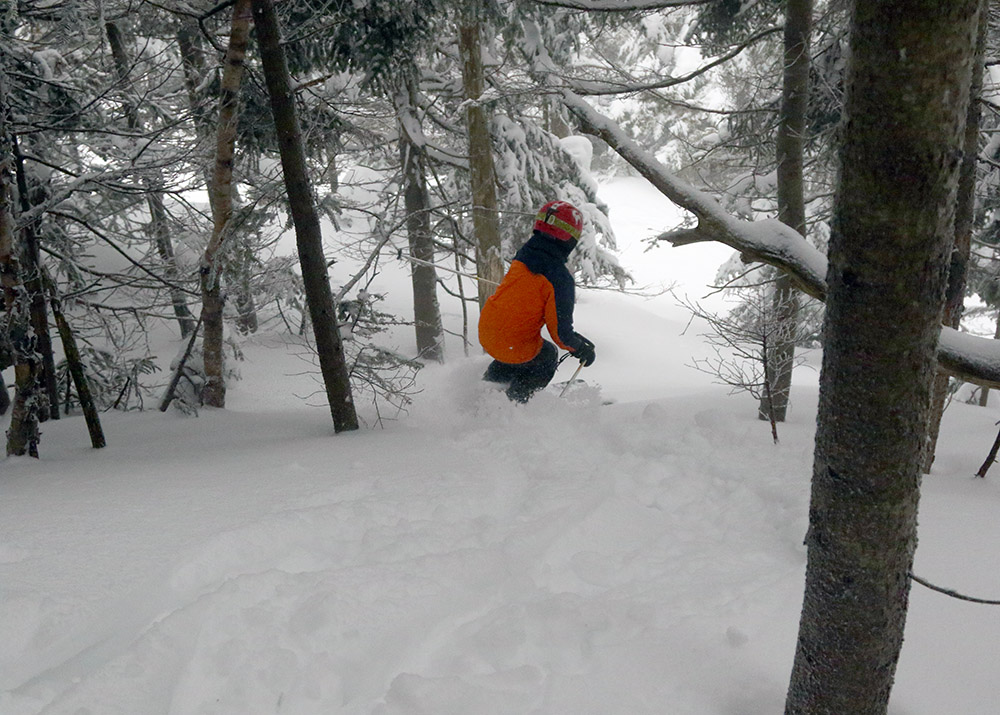 An image of Dylan skiing the trees of the Green Acres area of Stowe Mountain Resort in Vermont