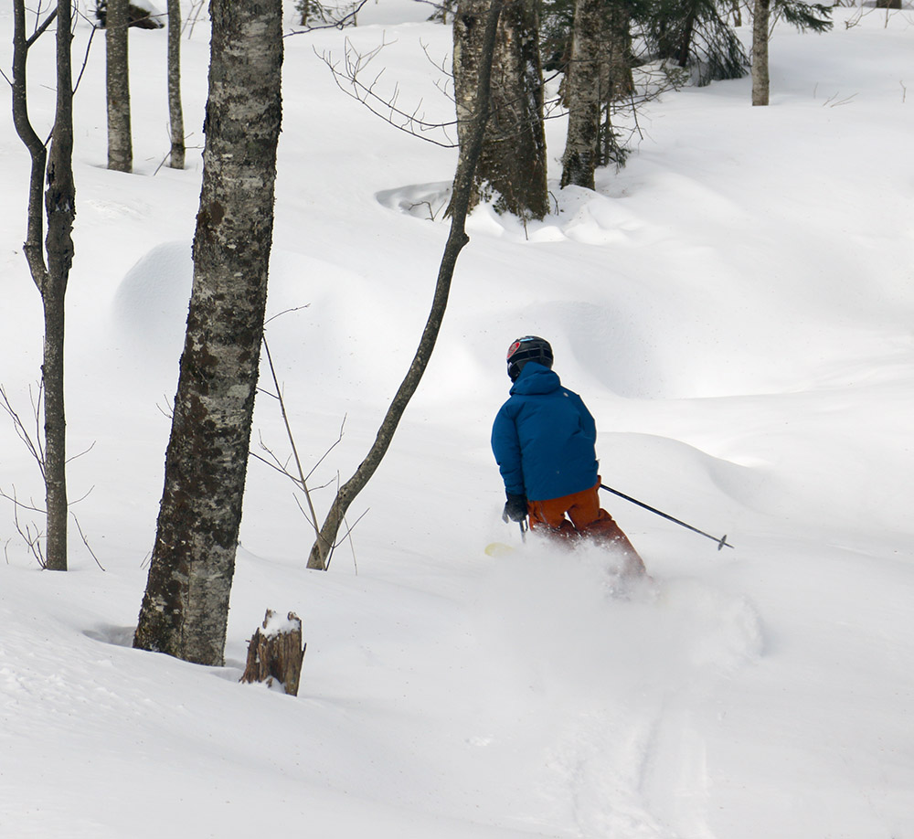 An image of Ty skiing in the Wilderness Woods area of Bolton Valley Resort in Vermont