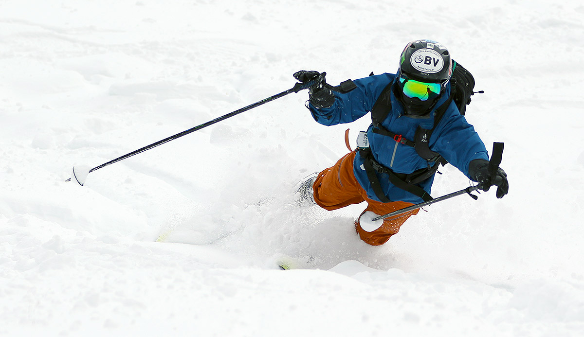 An image of Ty falling in the powder while on a ski tour at Bolton Valley Resort in Vermont