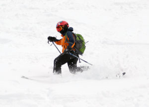 An imae of Dylan skiing some of the powder from November snowstorms at the Timberline area of Bolton Valley Resort in Vermont