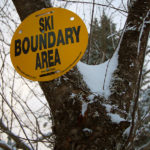 An image showing a ski area boundary sign from Bolton Valley Ski Resort in Vermont