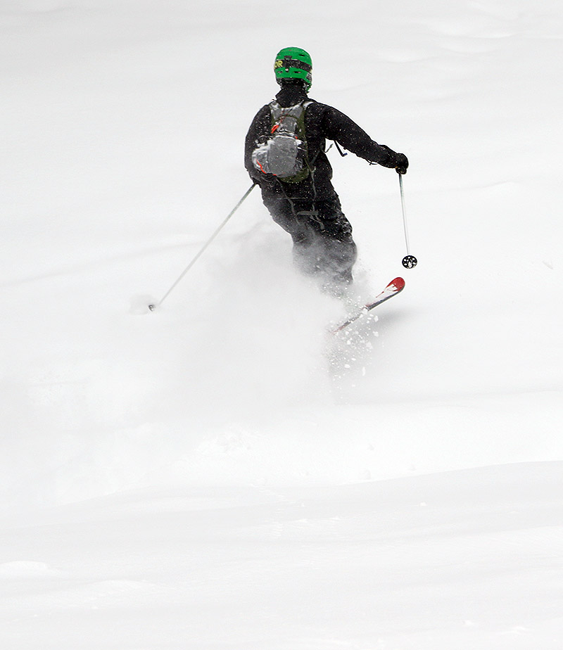 An image of Johannes jumping a water bar during a ski tour at Bolton Valley Resort in Vermont