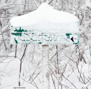 A trail sign covered in snow at Bolton Valley Ski Resort in Vermont
