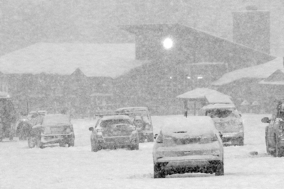 An image showing very heavy snowfall in the Mansfield parking lot at Stowe Mountain Resort in Vermont