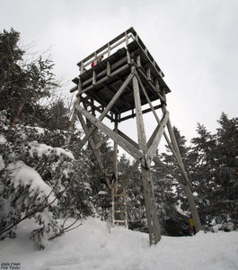 An image of the fire tower atop Vista Peak at Bolton Valley Ski Resort in Vermont