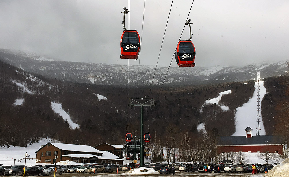 An image of the Over Easy Gondola from the Mansfield Parking Lot at Stowe Mountain Resort in Vermont