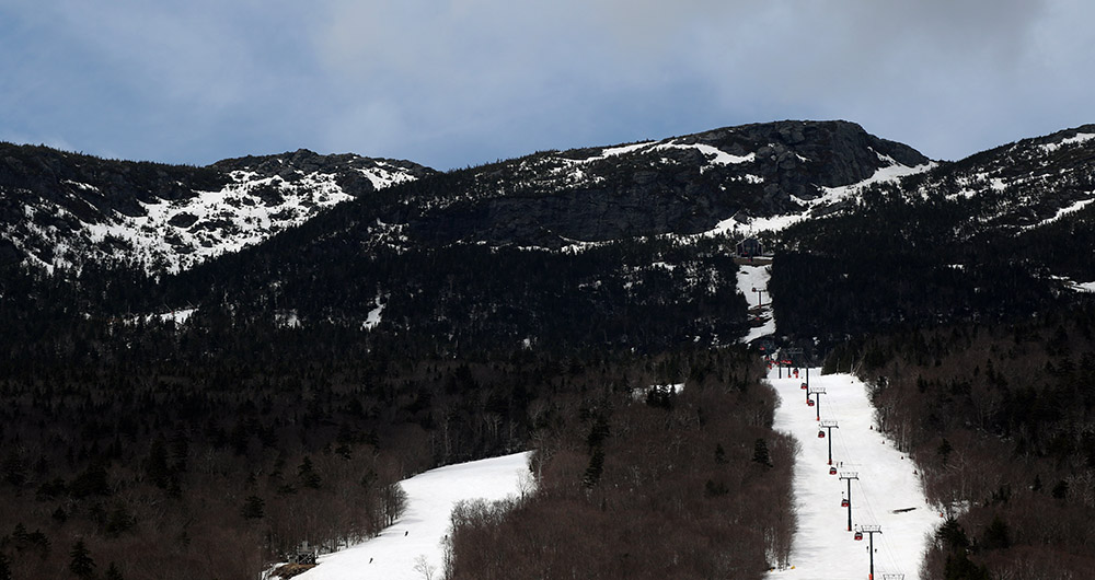 An image from Stowe Mountain Ski Resort in Vermont showing a view of the Gondola and the Mt. Mansfield ridgeline with the Rock Garden area visible in the upper left