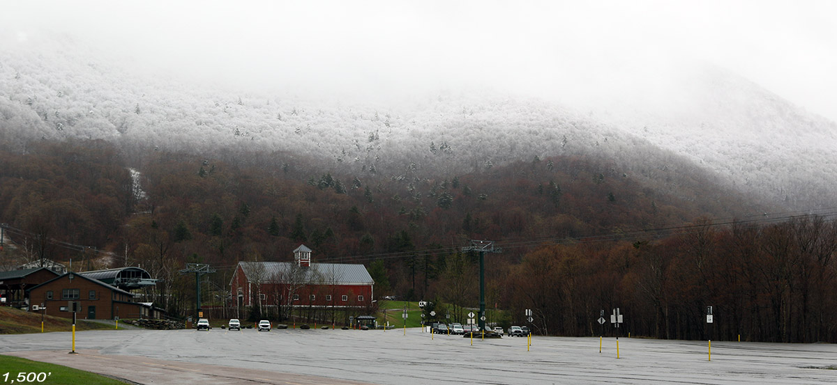 An image showing the snow line on Mt. Mansfield at the start of a ski tour in mid-May at Stowe Mountain Resort in Vermont