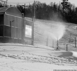 An image showing some snowmaking taking place in early November at the main base of Bolton Valley Ski Resort in Vermont