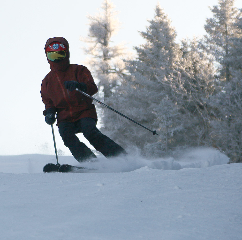 An image of Dylan skiing on the Alta Vista trail at Bolton Valley Resort in Vermont