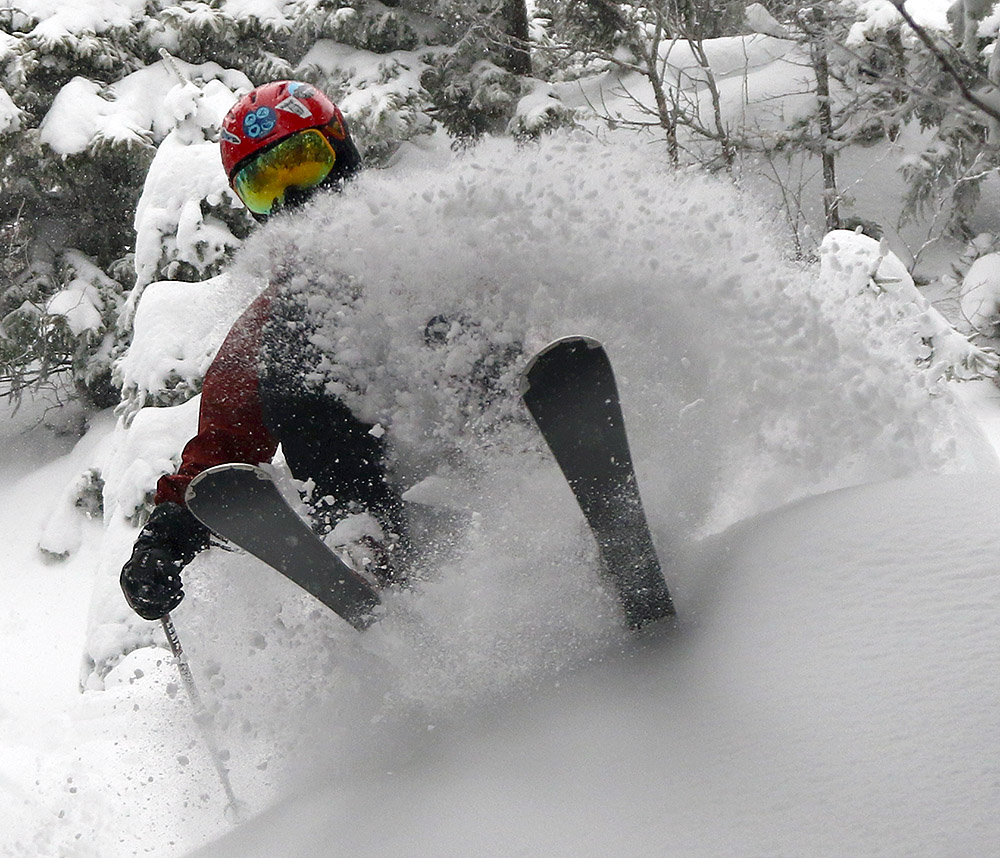 An image of Dylan blasting through powder in the Kitchen Wall area of Mt. Mansfield at Stowe Mountain Resort in Vermont