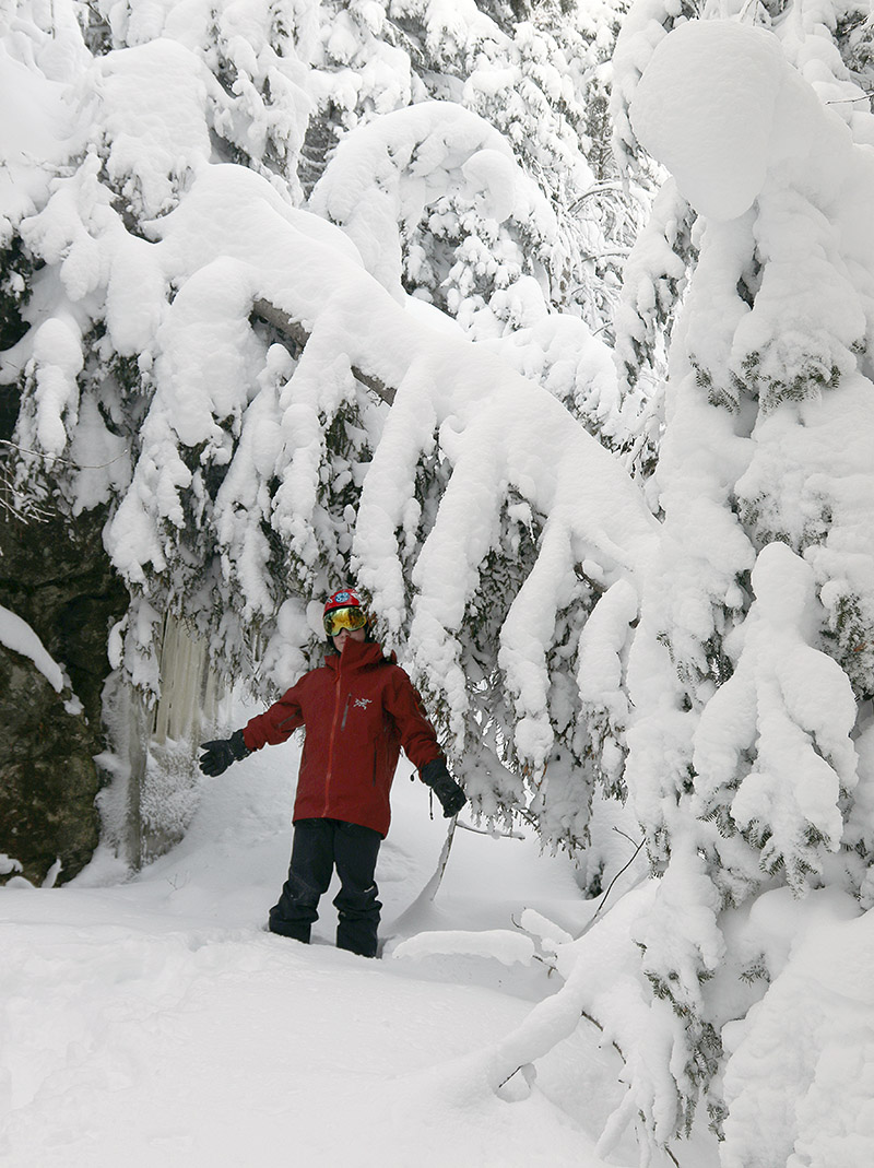 An image of Dylan in the snow laden trees off piste at Bolton Valley Ski Resort in Vermont after recent snows from Winter Storm Kade, Winter Storm Lamont, and Winter Storm Mabel.
