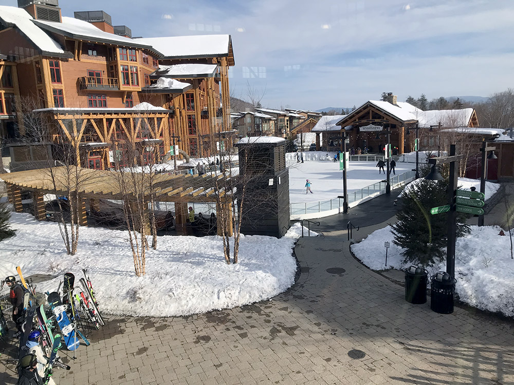 An image of Spruce Peak Village and the skating rink area at Stowe Mountain Ski Resort in Vermont