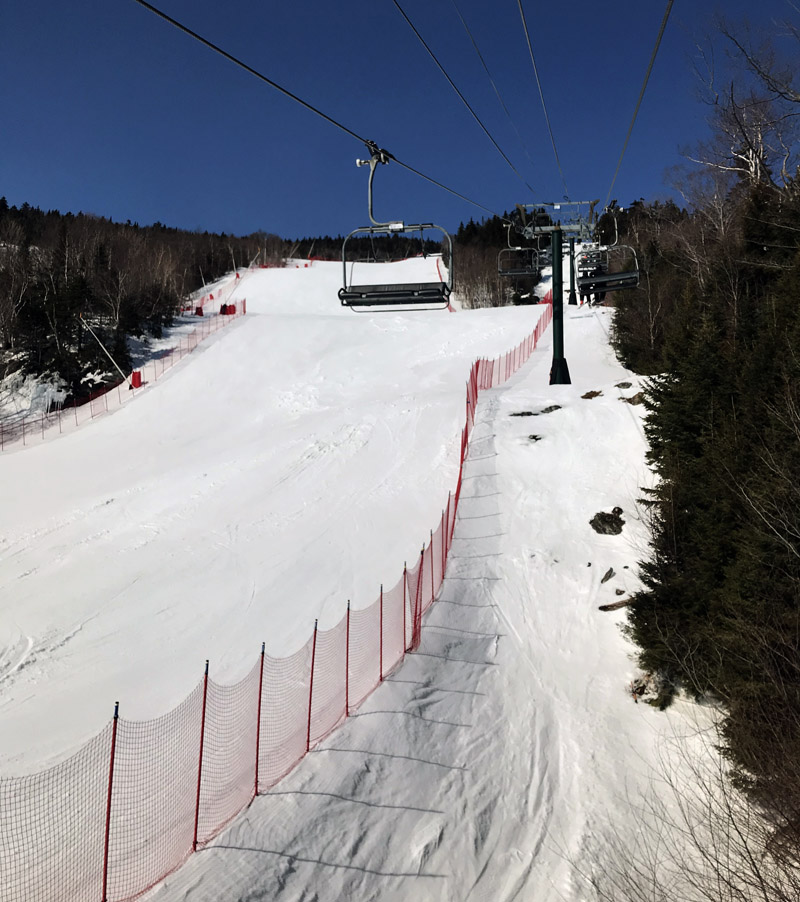 An image of the Main Street Trail set yup for racing at the Spruce Peak area of Stowe Mountain Resort in Vermont