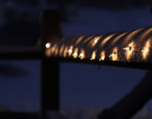 An image of Holiday lights outside The Mad Taco restaurant in the Village area of Bolton Valley Ski Resort in Vermont