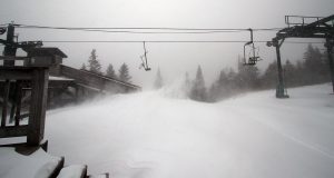 An image showing strong winds and heavy snow drifting during Winter Storm Quinlan at the Wilderness Summit area of Bolton Valley Ski Resort in Vermont