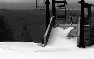 An image of the mid station area for the Wilderness Double Chairlift after an early April snowstorm at Bolton Valley Ski Resort in Vermont