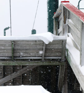 An image of snowfall and drifting snow at the Wilderness Summit during a late March snowstorm at Bolton Valley Ski Resort in Vermont