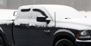 An image of a pickup truck covered in snow from a mid-November storm at Bolton Valley Ski Resort in Vermont