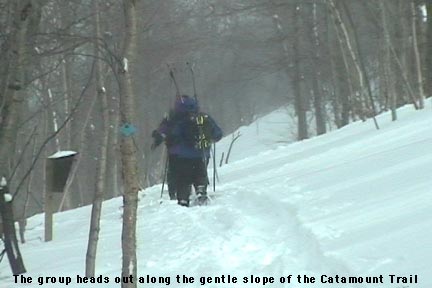 An image of Jay, Erica, James, and Dave setting out on the Catamount Trail off Route 242 during a backcountry ski tour of Gilpin Mountain near Jay Peak Resort in Vermont