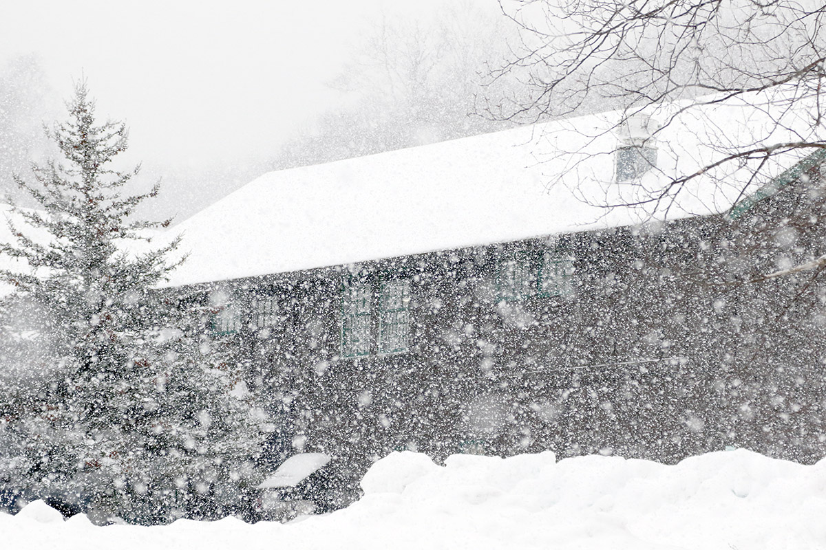 An image of heavy snowfall from Winter Storm Heather at the Timberline Base Lodge at Bolton Valley Ski Resort in Vermont