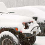 An image of heavy snowfall and accumulations on vehicles in the Timberline parking lot during Winter Storm Heather at Bolton Valley Ski Resort in Vermont