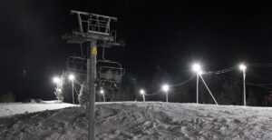 An image of the Valley Road terrain and the Vista Quad Chairlift during a night skiing session in  February after an Alberta Clipper system at Bolton Valley Ski Resort in Vermont