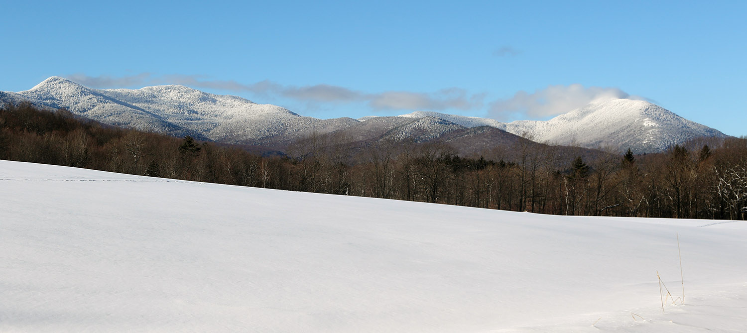 A view of the Sterling Mountain Range in Northern Vermont in January while approaching from the southeast