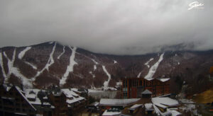 An image showing residual accumulations of snow on Mount Mansfield on one of the webcams at Stowe Mountain Ski Resort in Northern Vermont after an October snowstorm