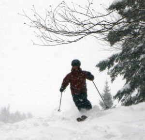 An image of Dylan skiing during Winter Storm Tormund in April 2024 at Bolton Valley Ski Resort in Vermont