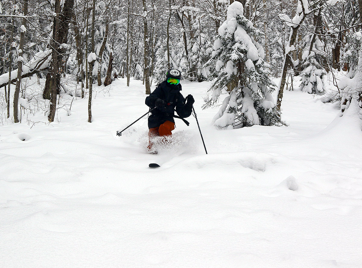 An image of Ty skiing in the Snow Hole area in early December after a continuous flow of smaller winter storms builds up the snowpack at Bolton Valley Ski Resort in Vermont