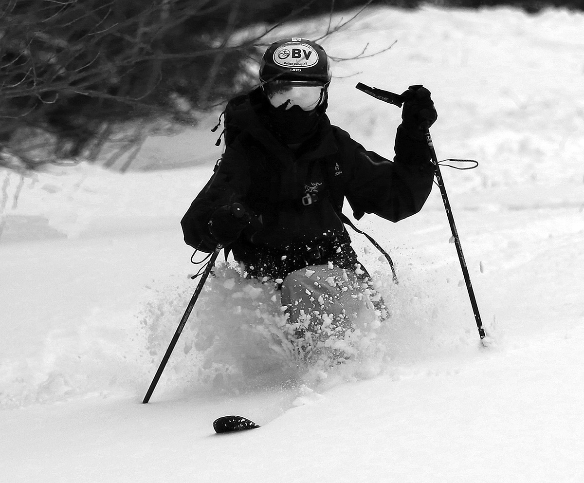 An image of Ty Telemark skiing in 20 inches of powder snow in early December at the Timberline area of Bolton Valley Ski Resort in Vermont